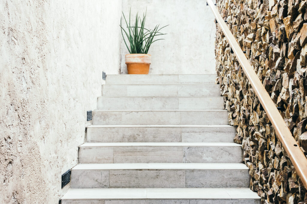 stone wall near stairs
